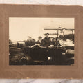 Lot 090 - Antique Boarded Photograph Of Three Men And Young Boy In Hats Driving In Early Automobile