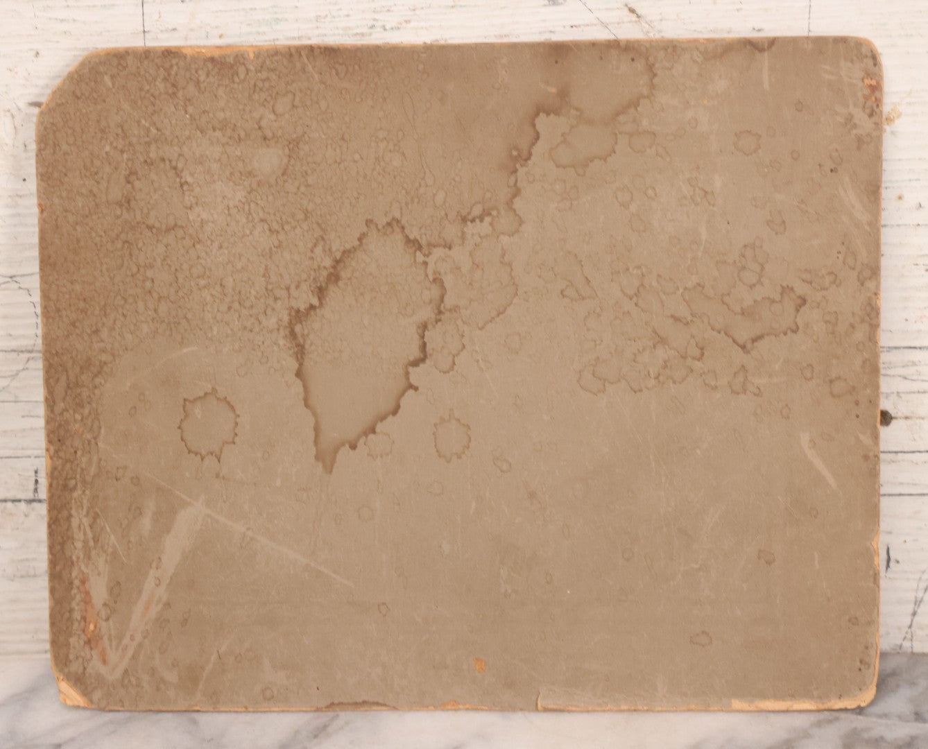 Lot 090 - Antique Boarded Photograph Of Three Men And Young Boy In Hats Driving In Early Automobile