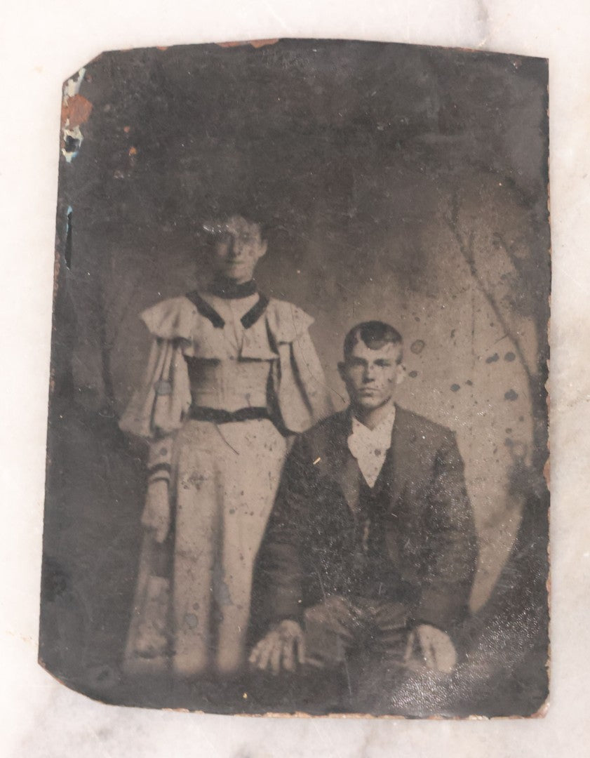 Lot 096 - Grouping Of Six Antique Tintype Photographs Including Souvenir Photo Of Girl On Model Horse, Family Of Five, And Group Photo With Old Man In Bowler Hat With Long White Beard