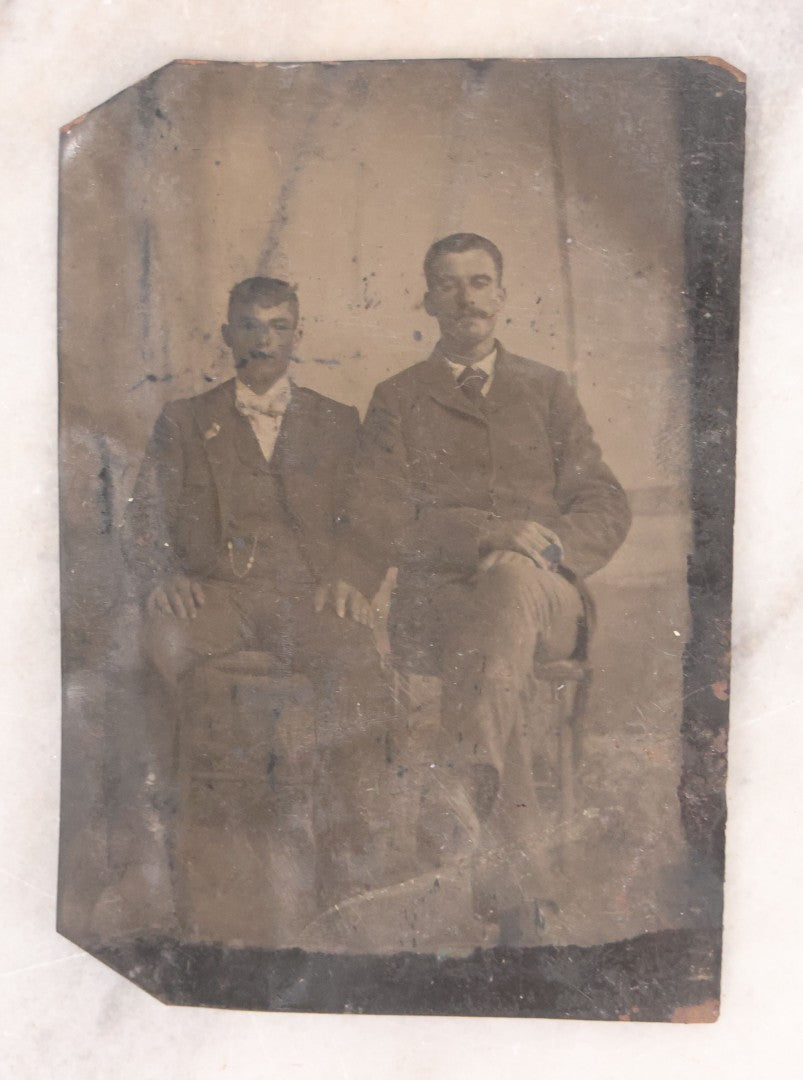 Lot 096 - Grouping Of Six Antique Tintype Photographs Including Souvenir Photo Of Girl On Model Horse, Family Of Five, And Group Photo With Old Man In Bowler Hat With Long White Beard