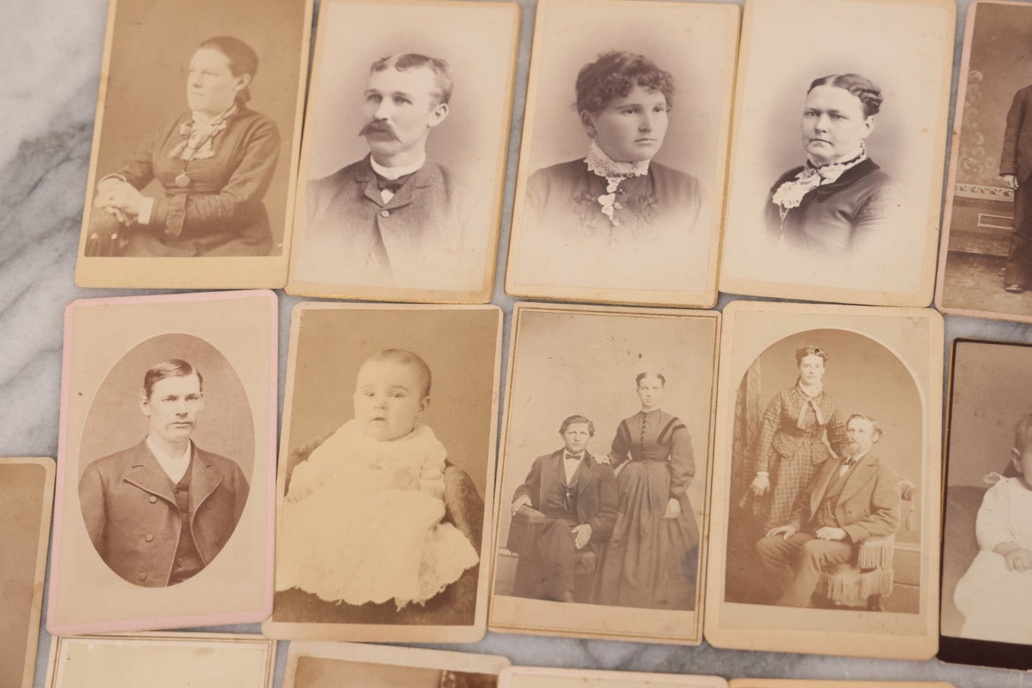 Lot 097 - Grouping Of 41 Carte De Visite C.D.V. Photographs Including Man In Bowler Hat, Man With Stick Cane, And Young Woman With Purple Tinted Dress