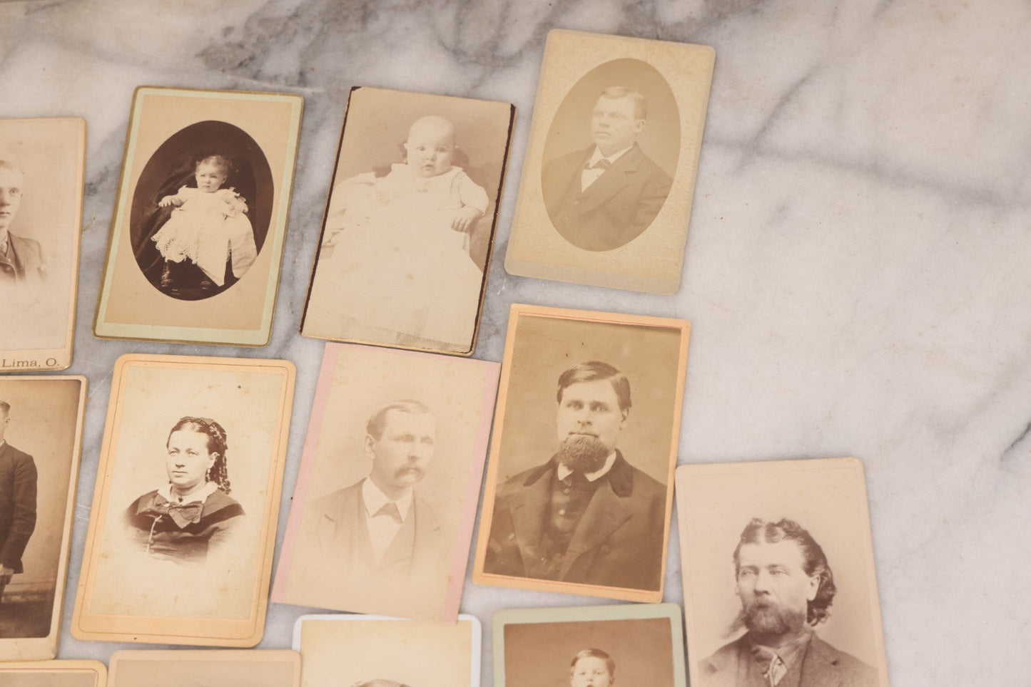 Lot 097 - Grouping Of 41 Carte De Visite C.D.V. Photographs Including Man In Bowler Hat, Man With Stick Cane, And Young Woman With Purple Tinted Dress