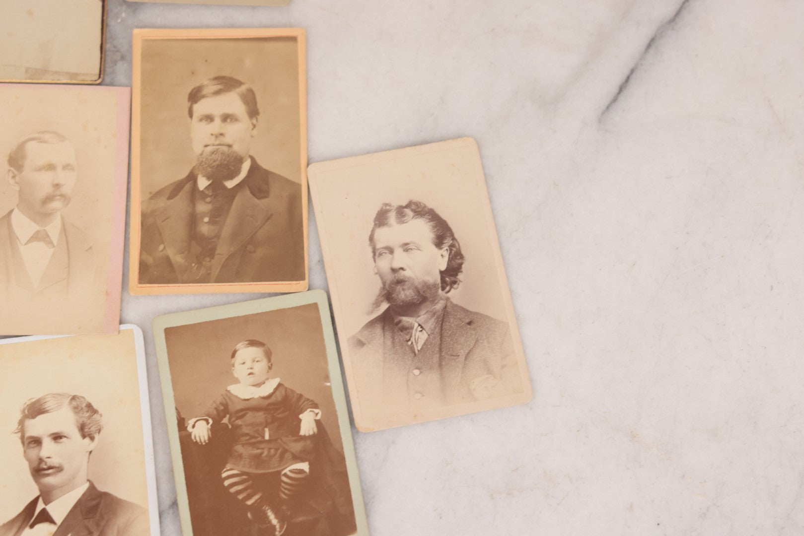 Lot 097 - Grouping Of 41 Carte De Visite C.D.V. Photographs Including Man In Bowler Hat, Man With Stick Cane, And Young Woman With Purple Tinted Dress