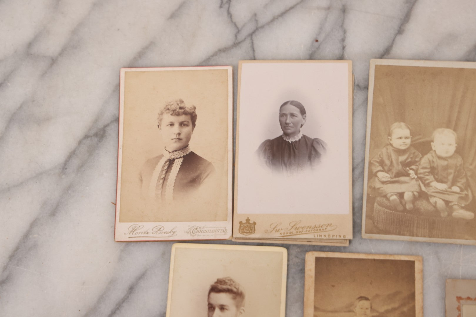 Lot 098 - Grouping Of 19 Antique Carte De Visite C.D.V. Photographs And Other Small Sized Portrait Photographs Including Two Hidden Mothers Of Babies, And Young Man In Navy Uniform