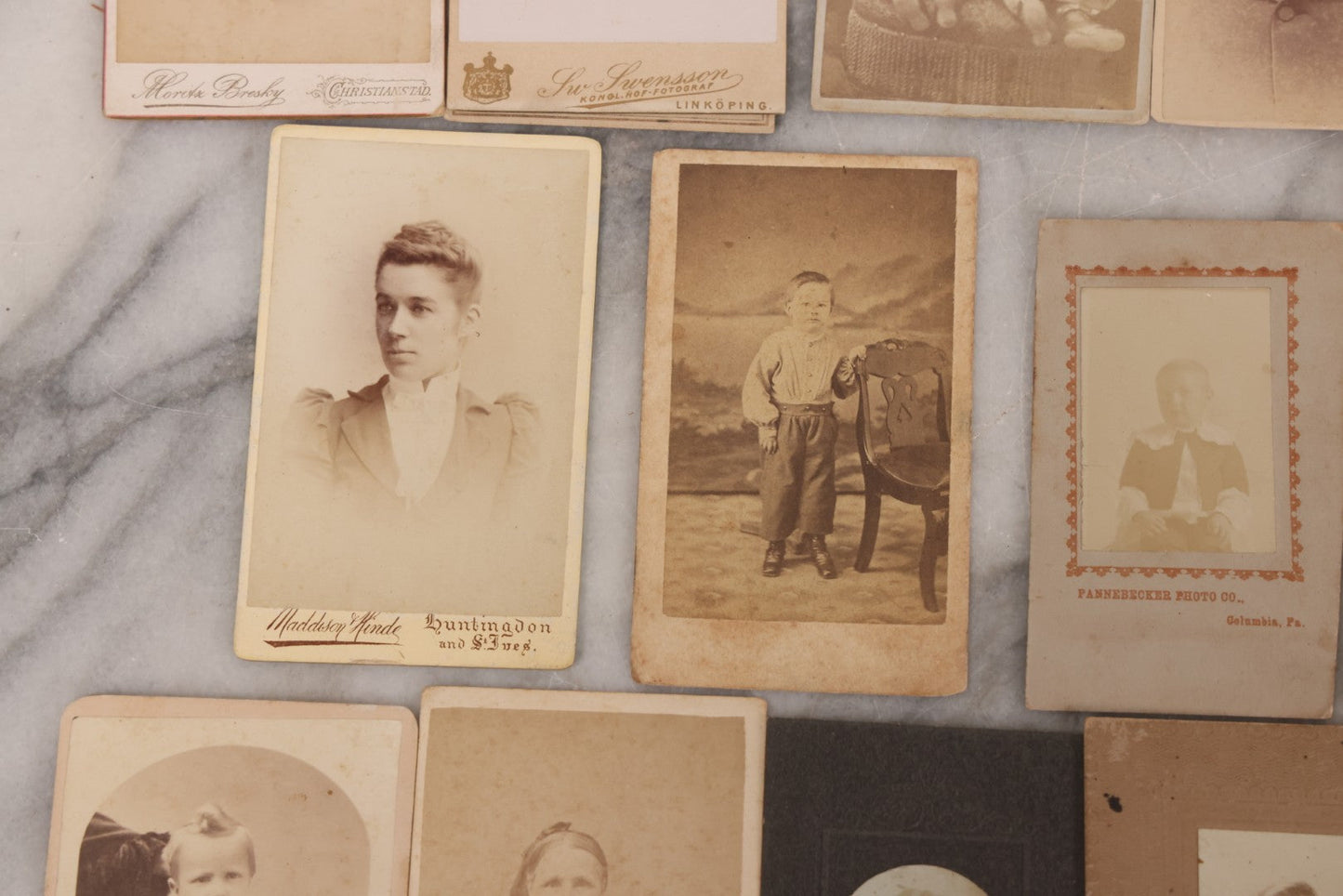 Lot 098 - Grouping Of 19 Antique Carte De Visite C.D.V. Photographs And Other Small Sized Portrait Photographs Including Two Hidden Mothers Of Babies, And Young Man In Navy Uniform