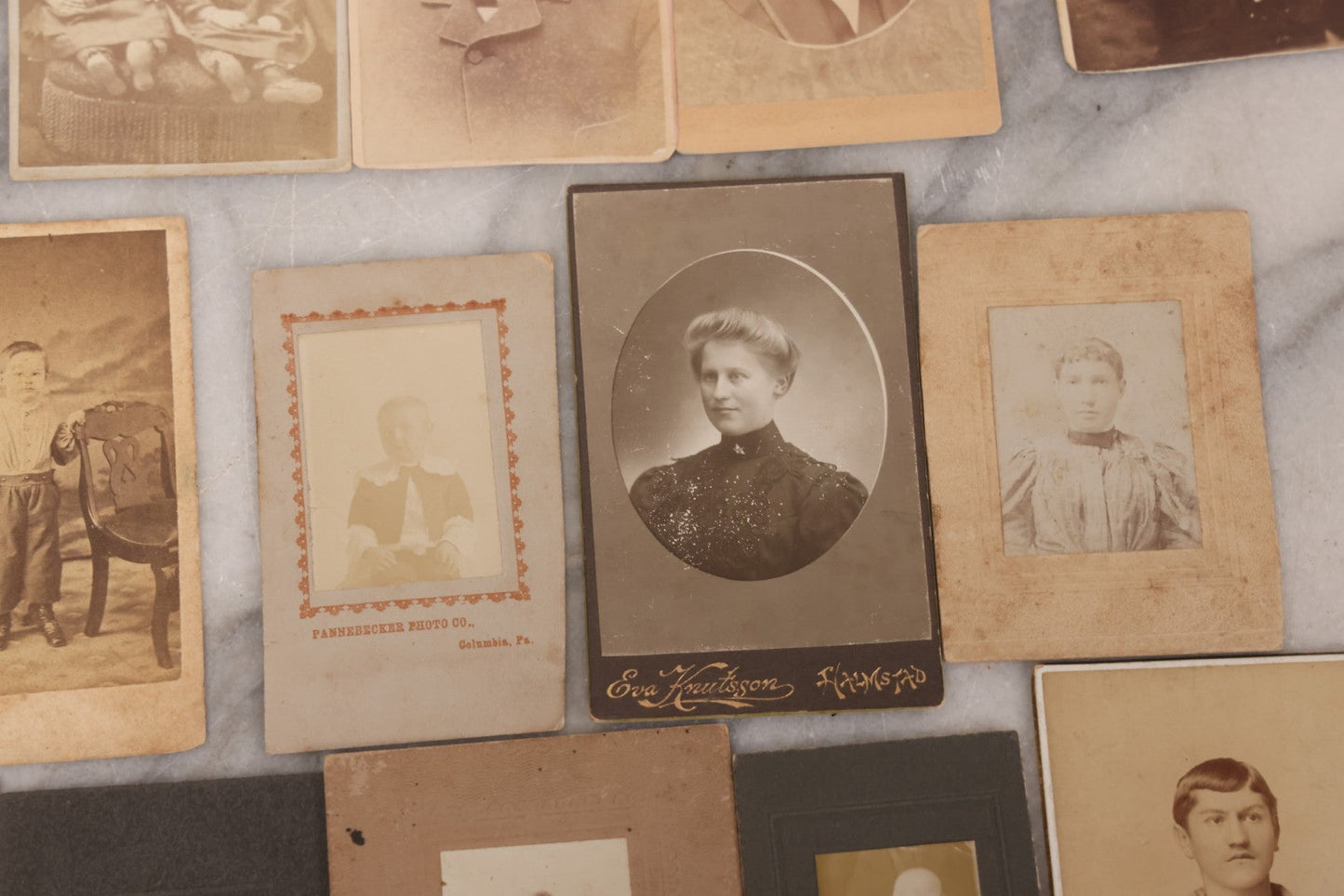 Lot 098 - Grouping Of 19 Antique Carte De Visite C.D.V. Photographs And Other Small Sized Portrait Photographs Including Two Hidden Mothers Of Babies, And Young Man In Navy Uniform