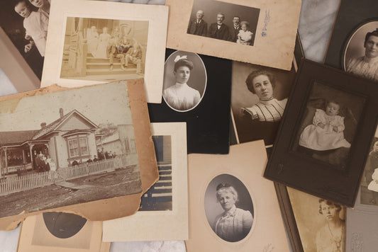 Lot 101 - Grouping Of 27 Vintage And Antique Photographs Including Many Portrait Photos, Two Photos Of Families Posing Outside, Tinted Photo Of Young Blonde Children, And Foldered Photo Of The Crockett Family Band