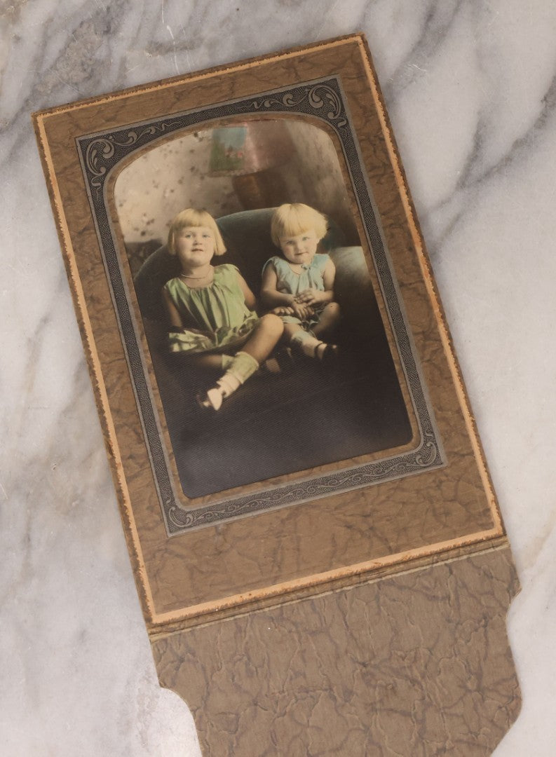 Lot 101 - Grouping Of 27 Vintage And Antique Photographs Including Many Portrait Photos, Two Photos Of Families Posing Outside, Tinted Photo Of Young Blonde Children, And Foldered Photo Of The Crockett Family Band