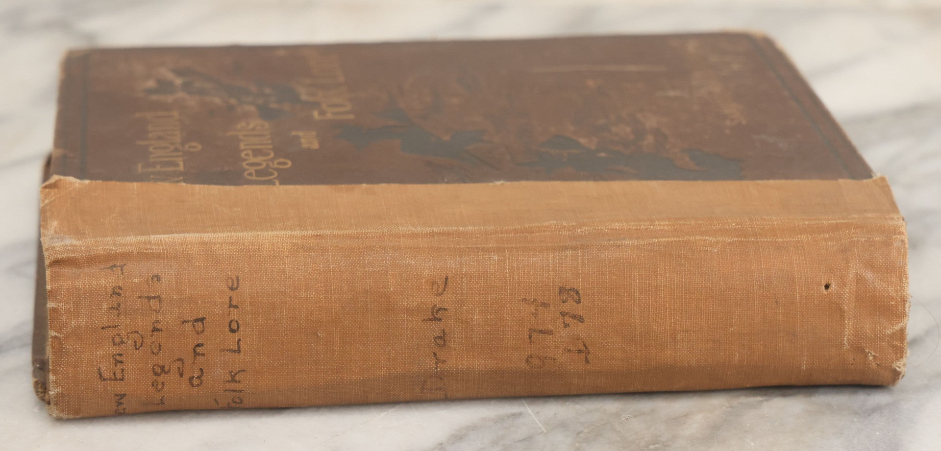 Lot 001 - "New England Legends And Folk Lore In Prose And Poetry" Antique Book By Samuel Adams Drake, Illustrated By F.T. Merrill With Witches On Broomsticks On Cover, Roberts Brothers, Publishers, Boston, 1884, Note Tape On Spine