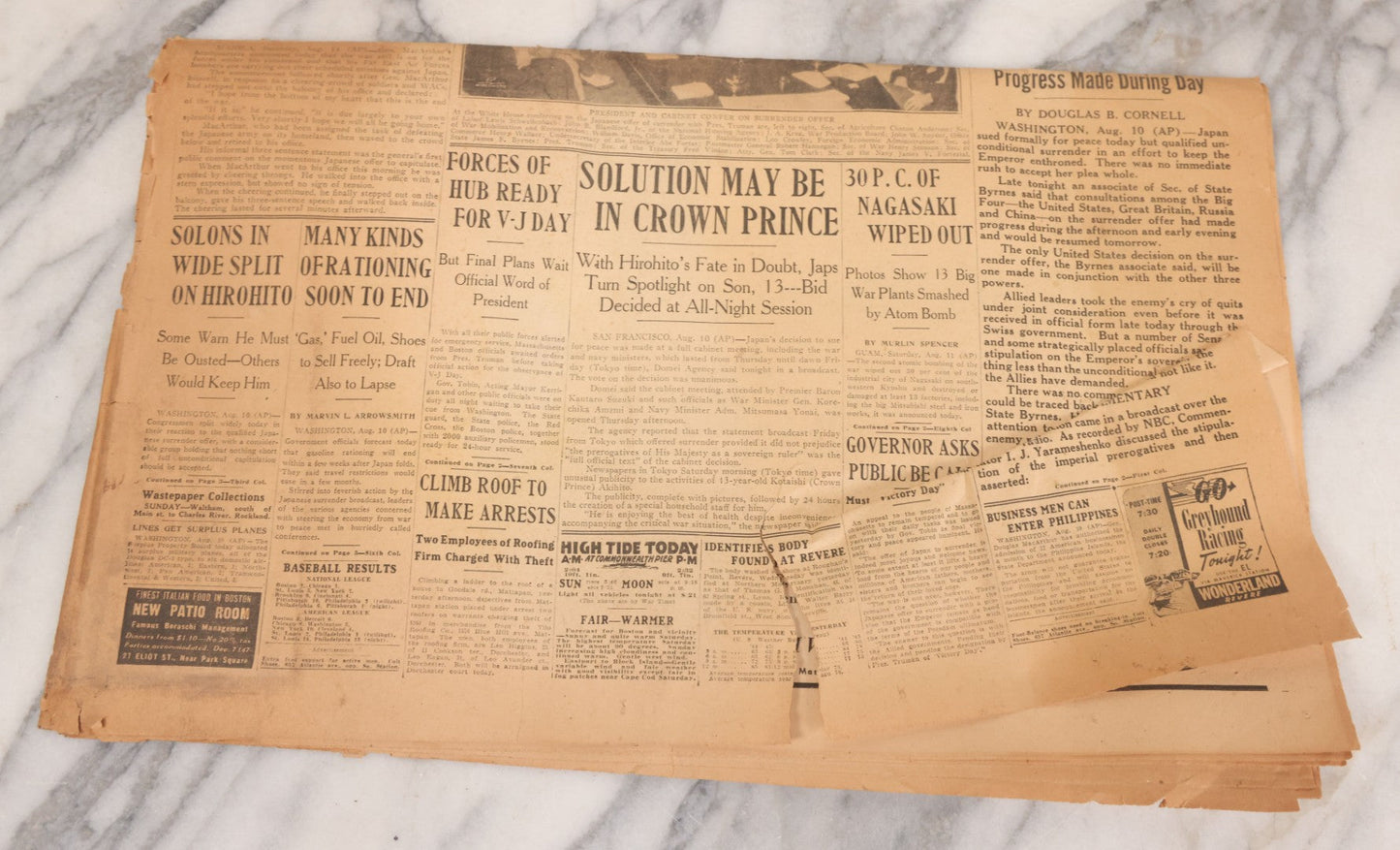 Lot 119 - Grouping Of Six World War Two Era Newspapers From The Boston Metro Area Reporting On Events From During And After The War Against Both The Germans And Japanese, With August 1945 Reporting On Use Of Atom Bomb, Dated 1942 Through 1945