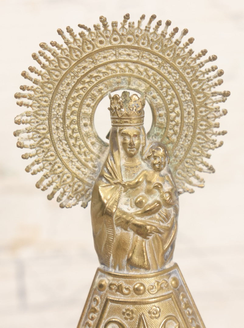 Lot 010 - Antique European Pressed Brass Virgin Mary Holding Child Devotional Statue, Depicting Our Lady Of The Pillar, After The First Marian Apparition In Zaragoza, Spain, 7-1/4" Height