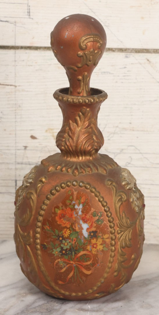 Lot 028 - Antique Hand Painted Baroque Renaissance Revival White Glass Decanter With Copper And Gold Paint, Ornate Grotesque Lion Mask Motif And Foliate Scrolls, Applied Flower Decal, And Original Matching Stopper, Circa 1900, 10-5/8" Height