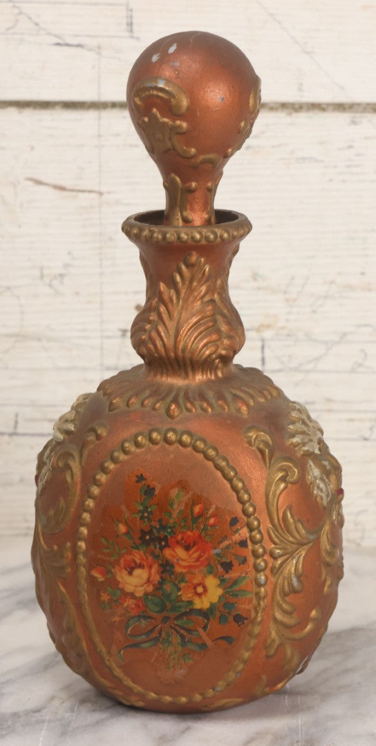 Lot 028 - Antique Hand Painted Baroque Renaissance Revival White Glass Decanter With Copper And Gold Paint, Ornate Grotesque Lion Mask Motif And Foliate Scrolls, Applied Flower Decal, And Original Matching Stopper, Circa 1900, 10-5/8" Height