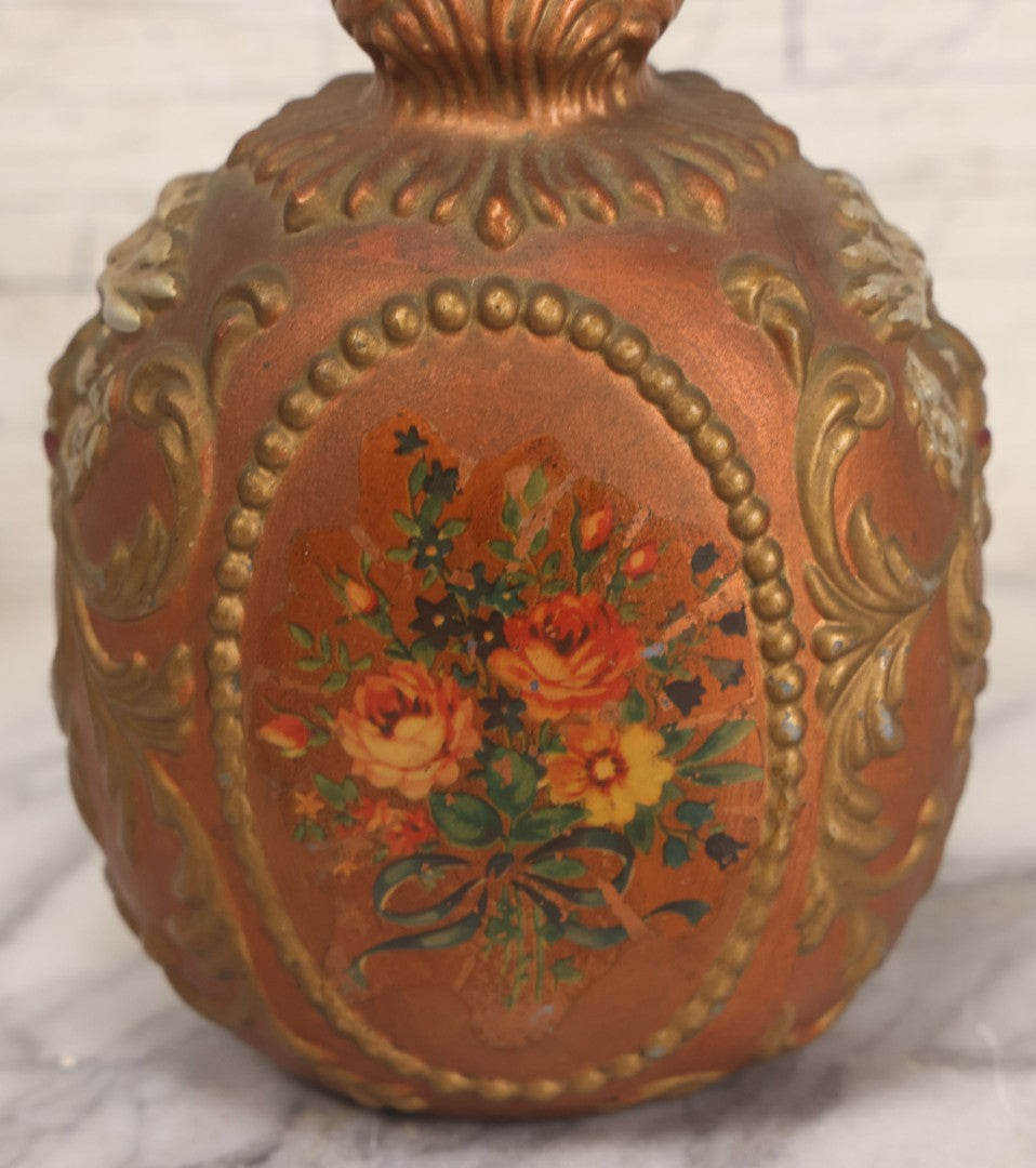 Lot 028 - Antique Hand Painted Baroque Renaissance Revival White Glass Decanter With Copper And Gold Paint, Ornate Grotesque Lion Mask Motif And Foliate Scrolls, Applied Flower Decal, And Original Matching Stopper, Circa 1900, 10-5/8" Height