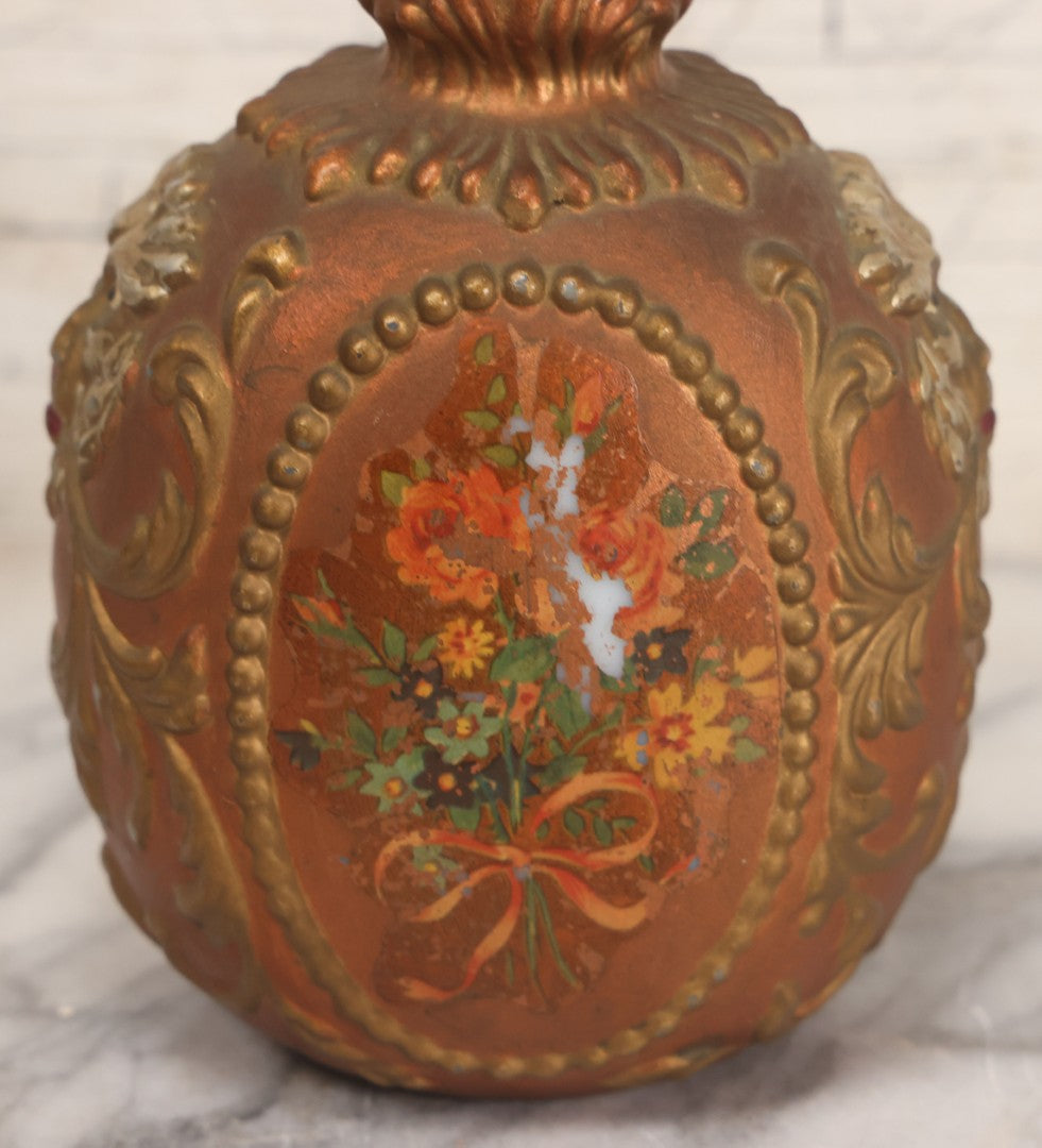 Lot 028 - Antique Hand Painted Baroque Renaissance Revival White Glass Decanter With Copper And Gold Paint, Ornate Grotesque Lion Mask Motif And Foliate Scrolls, Applied Flower Decal, And Original Matching Stopper, Circa 1900, 10-5/8" Height