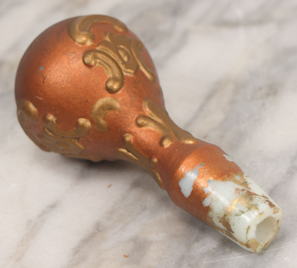 Lot 028 - Antique Hand Painted Baroque Renaissance Revival White Glass Decanter With Copper And Gold Paint, Ornate Grotesque Lion Mask Motif And Foliate Scrolls, Applied Flower Decal, And Original Matching Stopper, Circa 1900, 10-5/8" Height