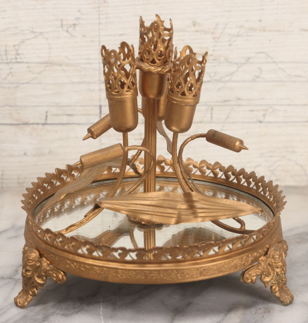 Lot 029 - Antique Gold Painted Metal Epergne Centerpiece Base With Greenman And Cattail Plant Motifs, Mirrored Tray, Missing Original Fluted Glass Vases