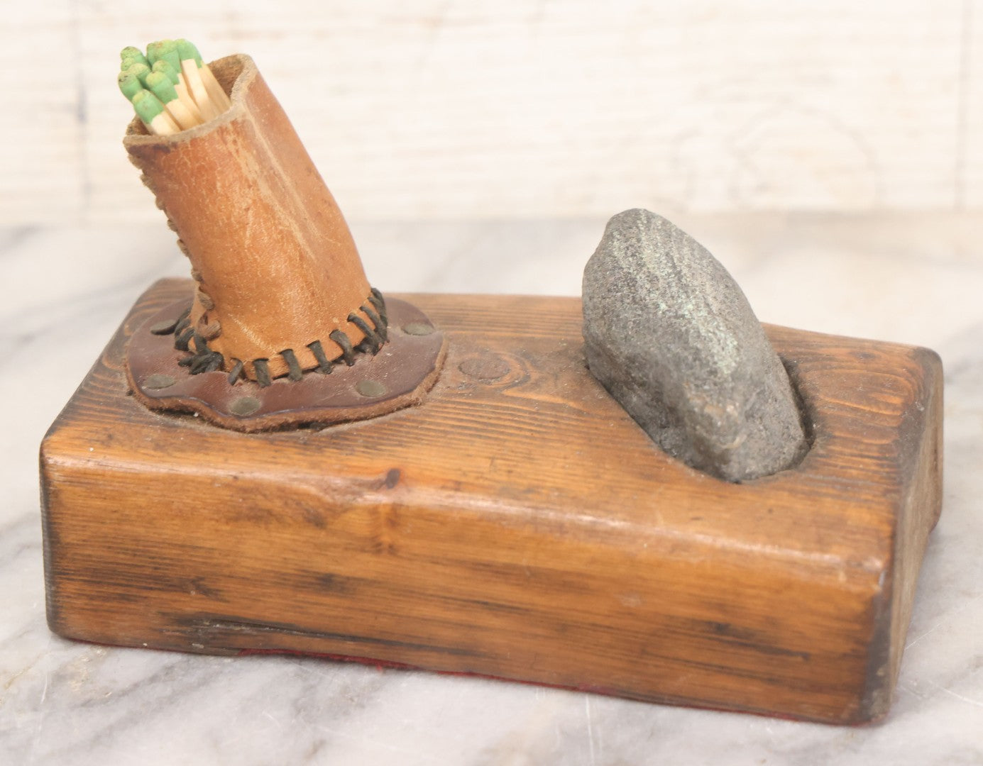 Lot 032 - Vintage Folk Art Mixed Material Match Safe And Strike With Wooden Block, Leather Match Holder And Real Rock Striker