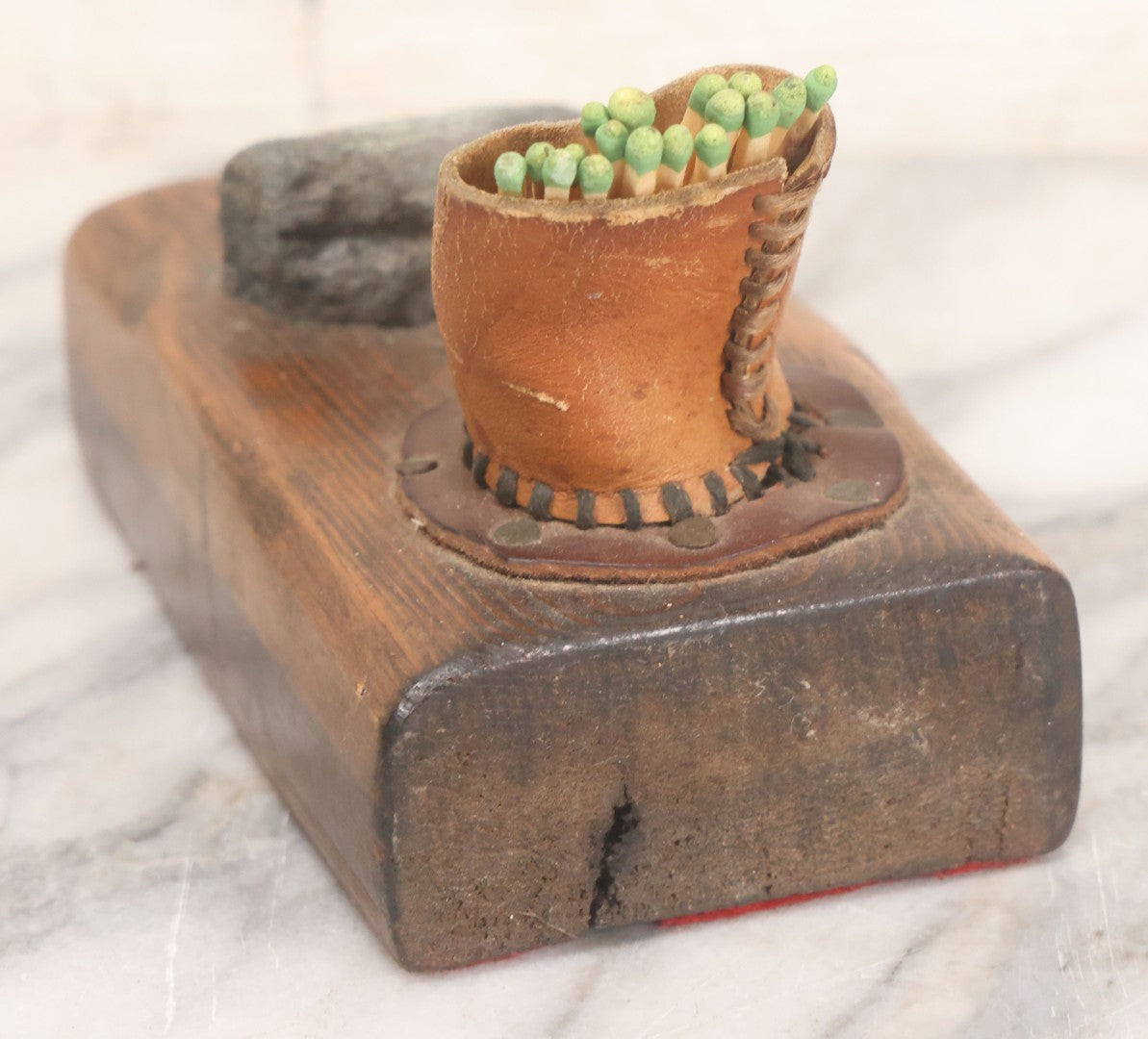 Lot 032 - Vintage Folk Art Mixed Material Match Safe And Strike With Wooden Block, Leather Match Holder And Real Rock Striker