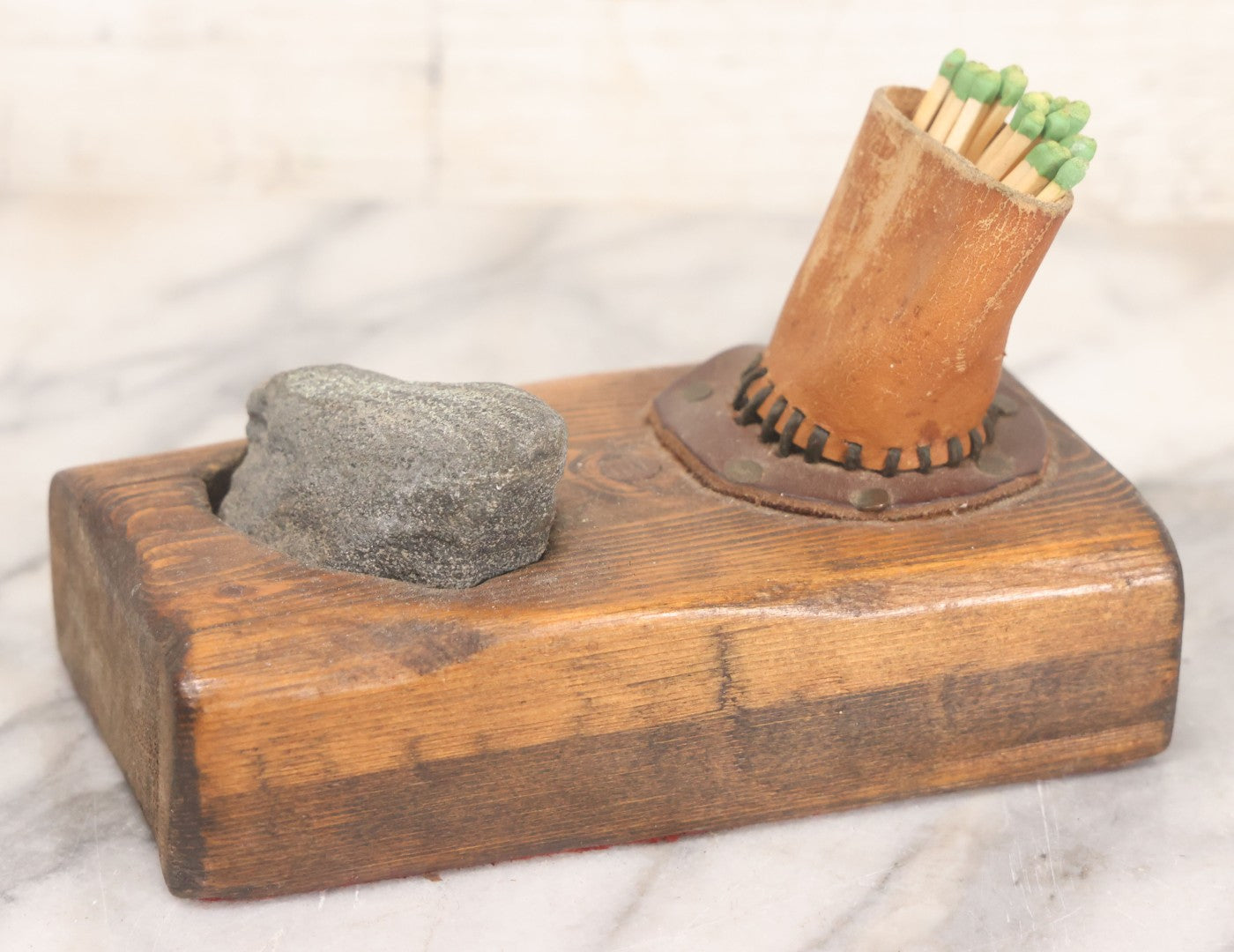 Lot 032 - Vintage Folk Art Mixed Material Match Safe And Strike With Wooden Block, Leather Match Holder And Real Rock Striker