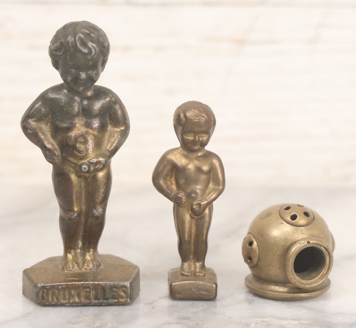 Lot 041 - Three Piece Miniature Brass Grouping Including Two Naked Peeing "Bruxelles" Boys And Miniature Brass Diving Helmet