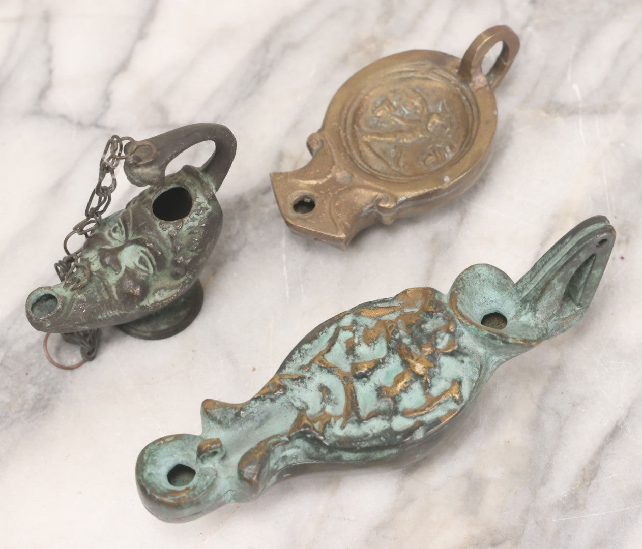 Lot 042 - Grouping Of Three Vintage Replica Cast Brass Roman Style Oil Lamps, Circa Mid Twentieth Century