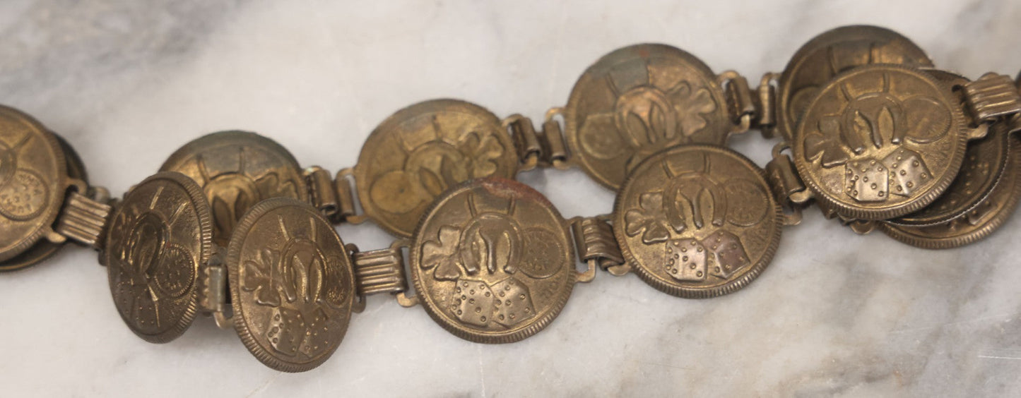 Lot 048 - Vintage Pressed Brass Good Luck Charm Necklace With Four Leaf Clover, Lucky Penny, Dice, Horseshoe, And Wishbone, With Fifteen Pressed "Coins"