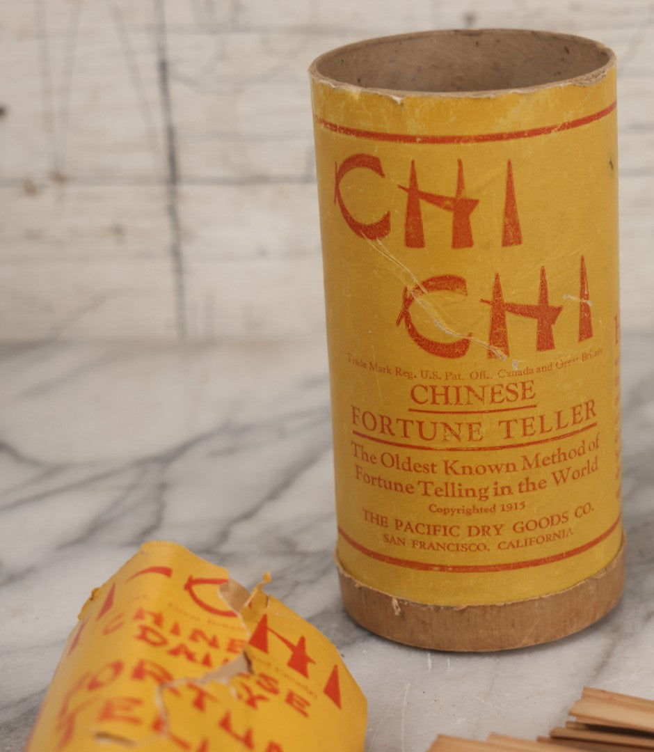 Lot 049 - Antique "Chi Chi" Chinese Fortune Teller Game, Bamboo Fortune Telling Sticks, "The Oldest Known Method Of Fortune Telling In The World," Copyright 1915, The Pacific Dry Goods Co., San Francisco, California, With Original Instructions