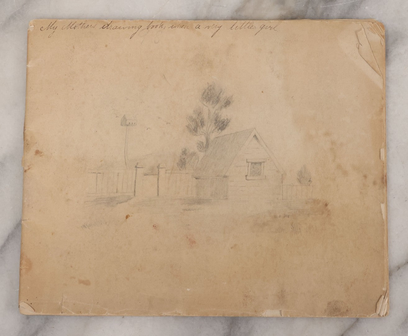 Lot 051 - Antique Sketchbook Containing Fourteen Original Hand Drawn Pencil Sketches, Of Buildings And Landscapes, With Handwritten Note On Cover "My Mother's Drawing Book When A Very Little Girl"