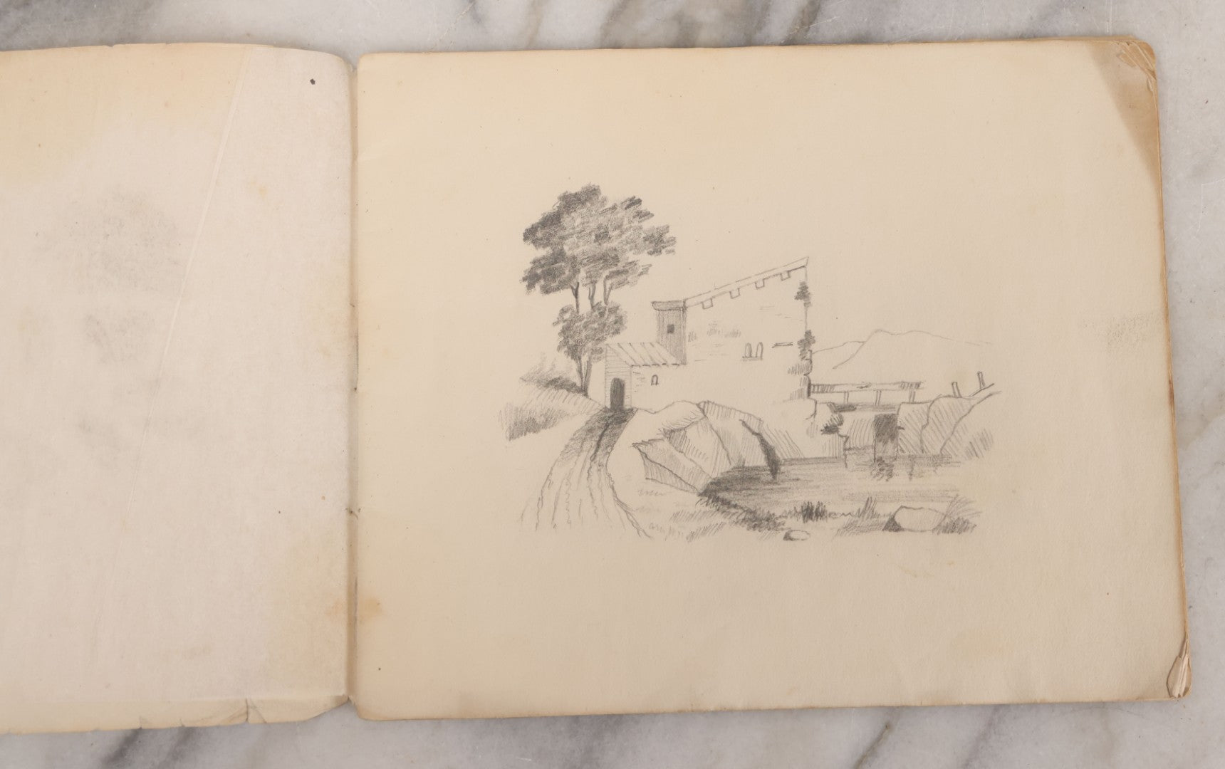 Lot 051 - Antique Sketchbook Containing Fourteen Original Hand Drawn Pencil Sketches, Of Buildings And Landscapes, With Handwritten Note On Cover "My Mother's Drawing Book When A Very Little Girl"