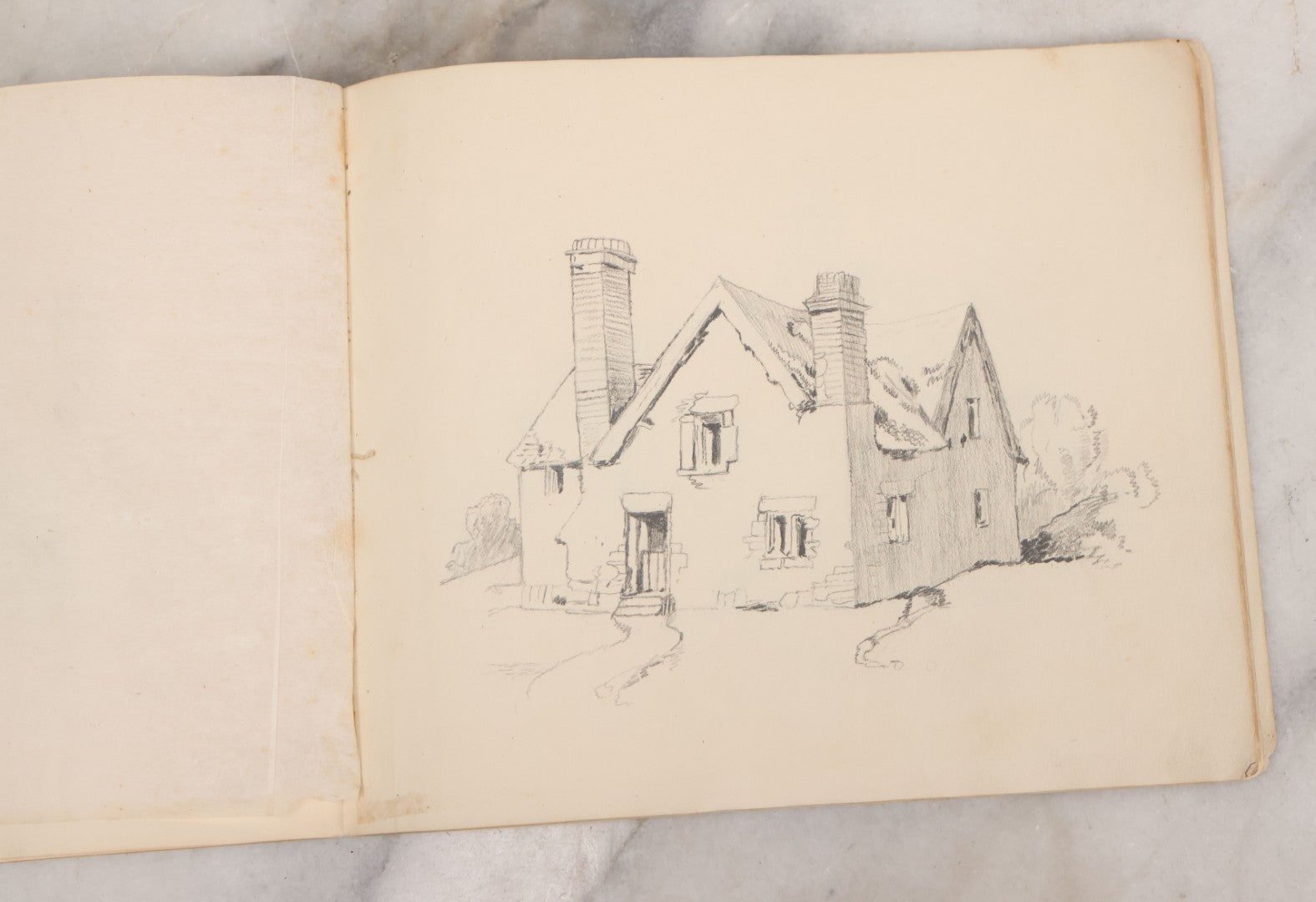 Lot 051 - Antique Sketchbook Containing Fourteen Original Hand Drawn Pencil Sketches, Of Buildings And Landscapes, With Handwritten Note On Cover "My Mother's Drawing Book When A Very Little Girl"