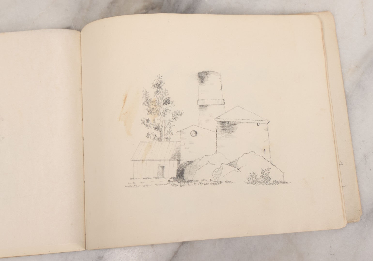 Lot 051 - Antique Sketchbook Containing Fourteen Original Hand Drawn Pencil Sketches, Of Buildings And Landscapes, With Handwritten Note On Cover "My Mother's Drawing Book When A Very Little Girl"