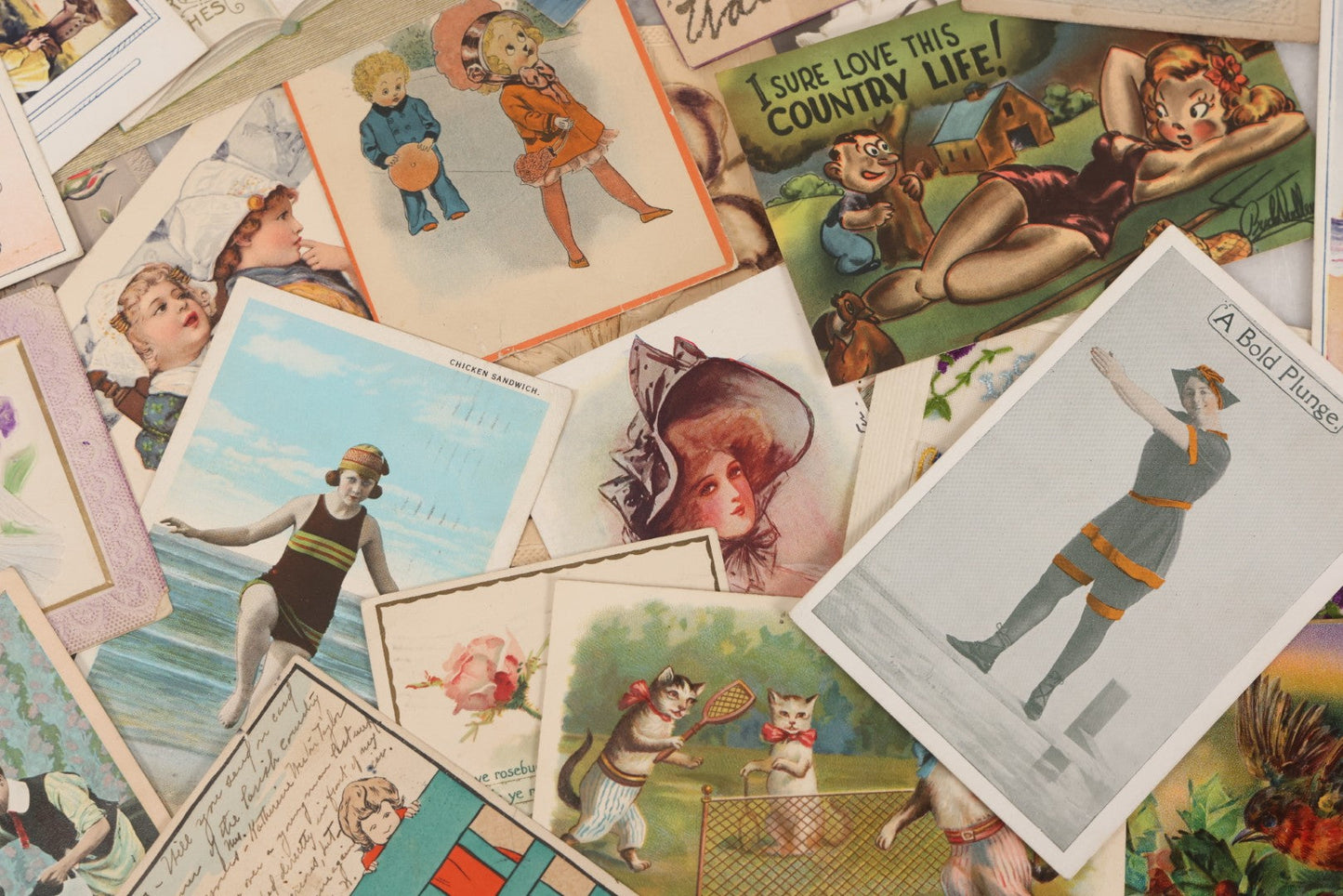 Lot 053 - Grouping Of 60+ Antique And Vintage Postcards Of Various Subjects Including Cats And Dogs, Beach Scenes, Valentines And Romance, Caricatures, And General Greeting Cards