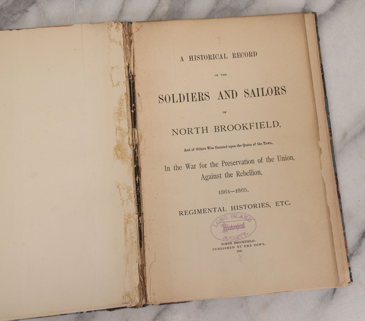 Lot 060 - "A Historical Record Of The Soldiers And Sailors Of North Brookfield (Massachusetts), In The War For The Preservation Of The Union Against The Rebellion 1861-1865 Regimental Histories, Etc." Antique Book Published By The Town, 1886, Rebound
