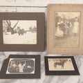Lot 065 - Grouping Of Four Antique Boarded Photographs Of People And Animals Including Cat In Snow, Cow Being Hugged By Children, Fluffy Cat Photographed With Its Family, Black Horse