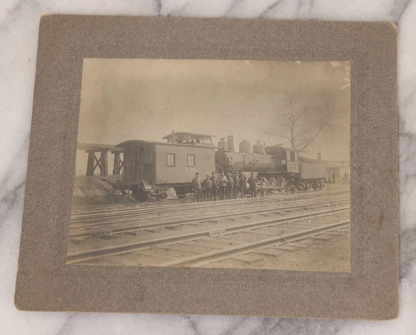 Lot 066 - Six Piece Railroad Photography And Ephemera Grouping Including Five Boarded Photographs Of Locomotives, Trains, And Railroad Workers, And Delivery Receipt From Old Colony Railroad Company, Leominster, Massachusetts