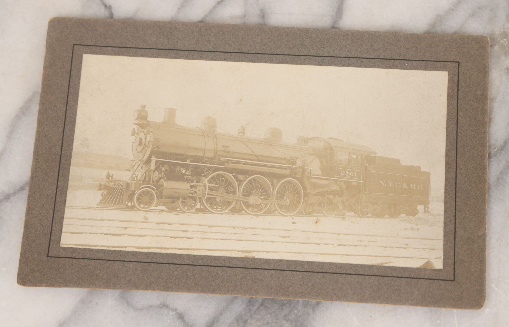 Lot 066 - Six Piece Railroad Photography And Ephemera Grouping Including Five Boarded Photographs Of Locomotives, Trains, And Railroad Workers, And Delivery Receipt From Old Colony Railroad Company, Leominster, Massachusetts