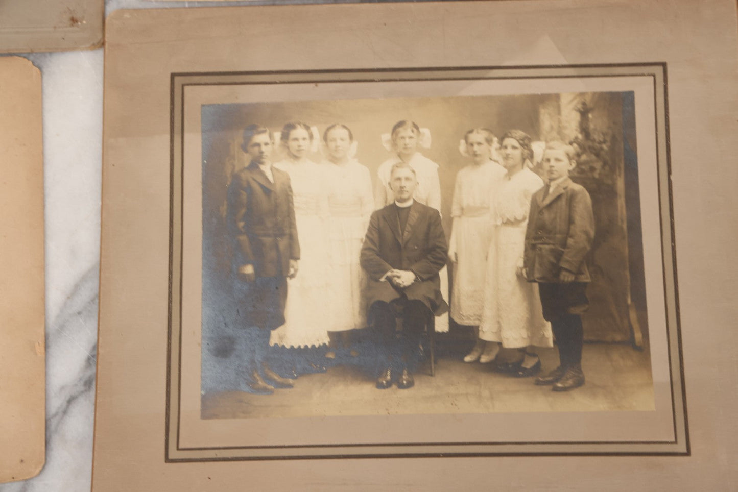 Lot 067 - Grouping Of Six Antique Boarded Photographs Of Schoolchildren Including Group Of First Communion Recipients Posing With Priest, Group Posing With Principal, And More