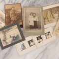 Lot 070 - Grouping Of Seven Antique Photographs Of Children, Including Makeshift Frame Of Girl In Four Views, Children Posing On New York City Stoop, Children In Cribs, Boy Posing With Toys