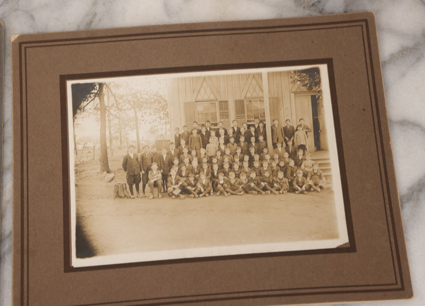 Lot 071 - Grouping Of Four Antique Boarded Photographs Of Class Photos Of Schoolchildren, Including Children Posing With Chicken In Background, Children Posing On School Steps, And Children Posing Beneath Fire Escape