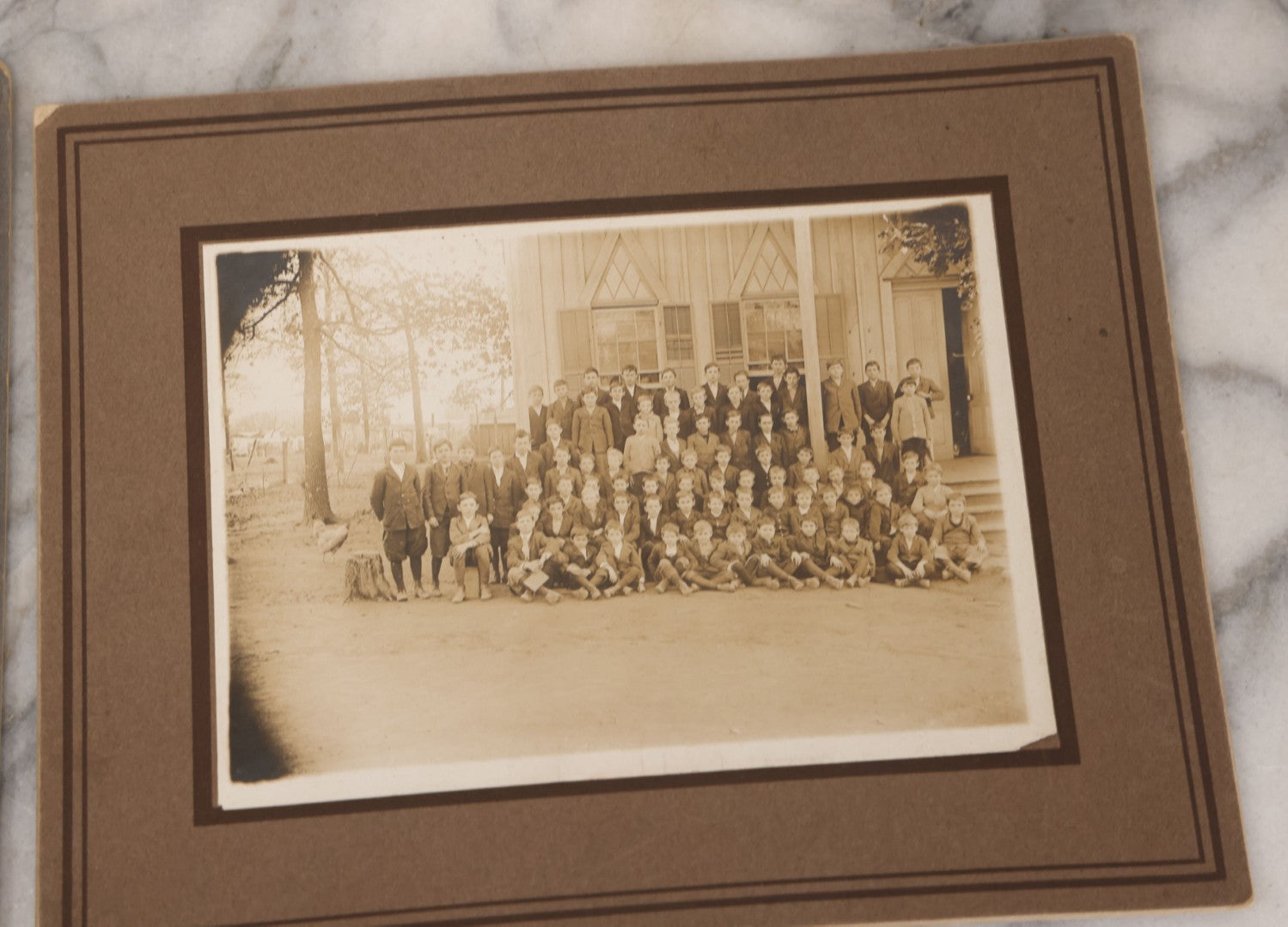 Lot 071 - Grouping Of Four Antique Boarded Photographs Of Class Photos Of Schoolchildren, Including Children Posing With Chicken In Background, Children Posing On School Steps, And Children Posing Beneath Fire Escape
