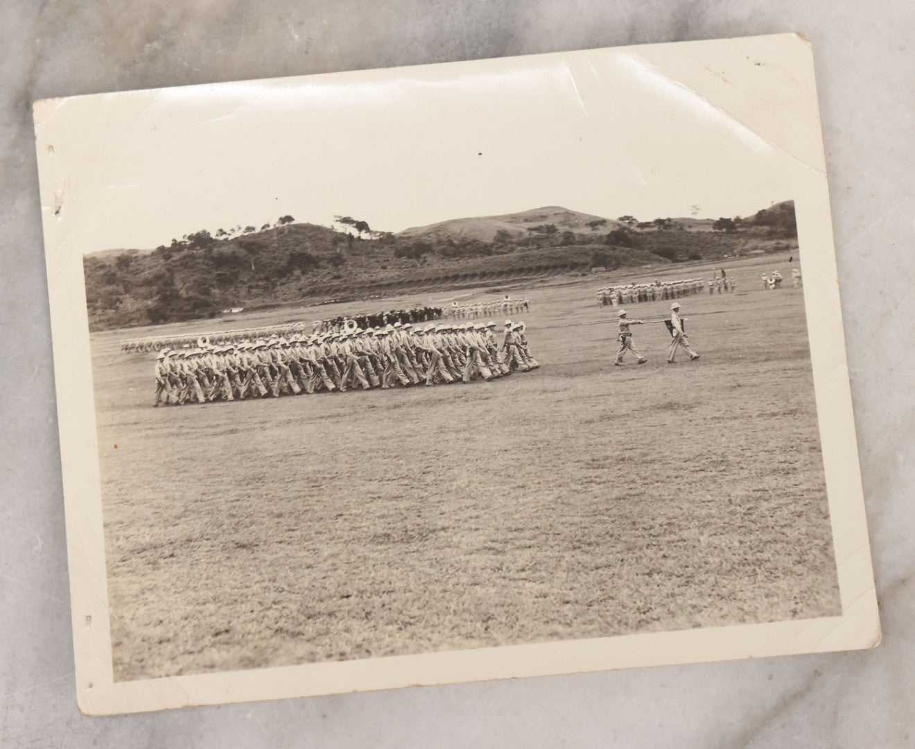 Lot 073 - Grouping Of Eight Vintage Snapshot Photographs, Including Photos Of Marching Soldiers, Barracks, Prison Ruins, And Fire Destruction