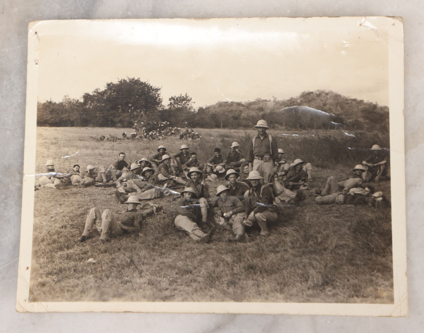 Lot 073 - Grouping Of Eight Vintage Snapshot Photographs, Including Photos Of Marching Soldiers, Barracks, Prison Ruins, And Fire Destruction