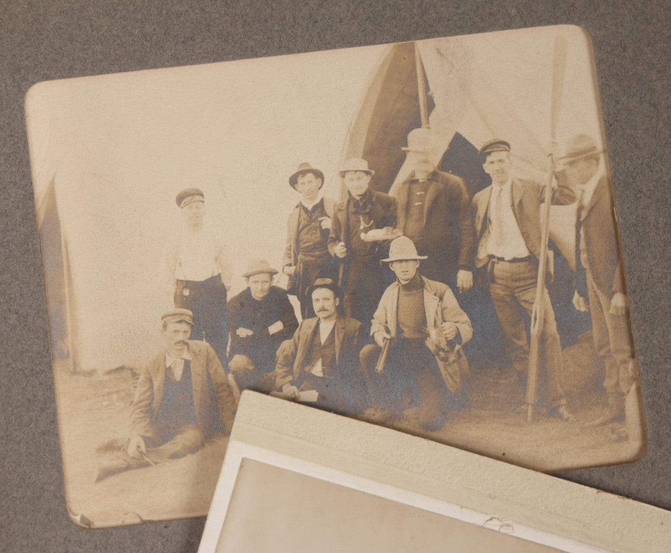 Lot 080 - Grouping Of Seven Antique Boarded Photographs Including Hunters Posing With Shotgun, Business Men In Bowler Hats, And Family Of Six