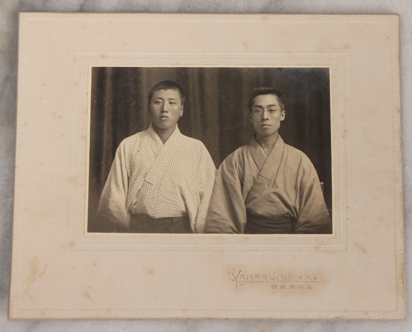 Lot 081 - Antique Boarded Photograph Of Two Japanese Men, Yamaguchi Photo Studio, Yamagata City, Japan
