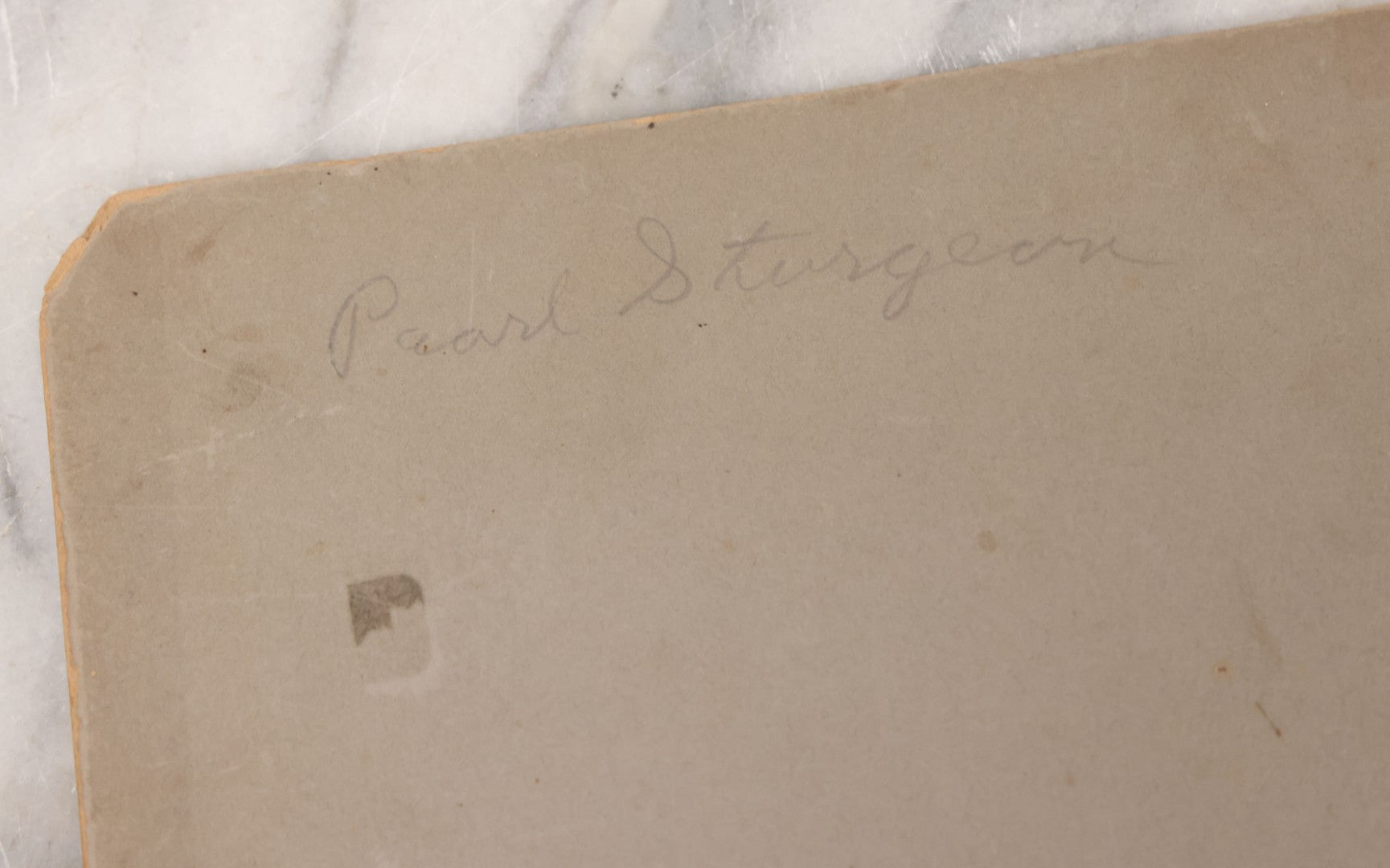 Lot 084 - Antique Boarded Occupational Photograph Of Three Men Inspecting A Large Variety Of Corn, With Advertisement For "The 'Faultless' Malleable Iron Range" In Background