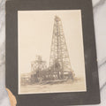 Lot 085 - Antique Boarded Occupational Photograph Of Six Men Posing At The Foot Of A Period Oil Well Rig