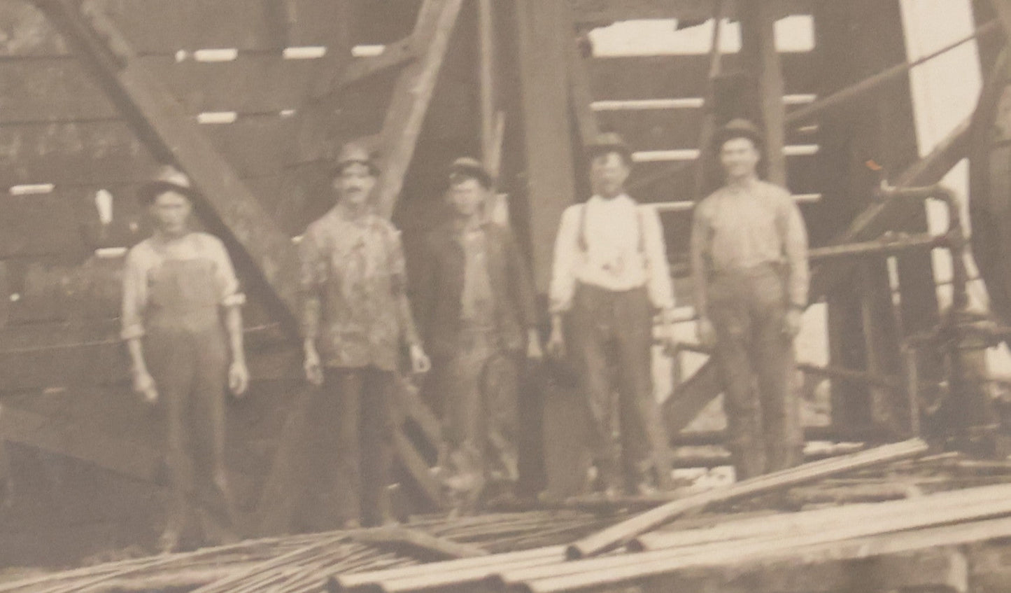 Lot 085 - Antique Boarded Occupational Photograph Of Six Men Posing At The Foot Of A Period Oil Well Rig
