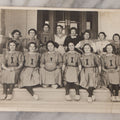 Lot 089 - Antique Unmounted Photograph Of Group Of Young Female Athletes Posing In Handmade Uniforms With Medicine Ball