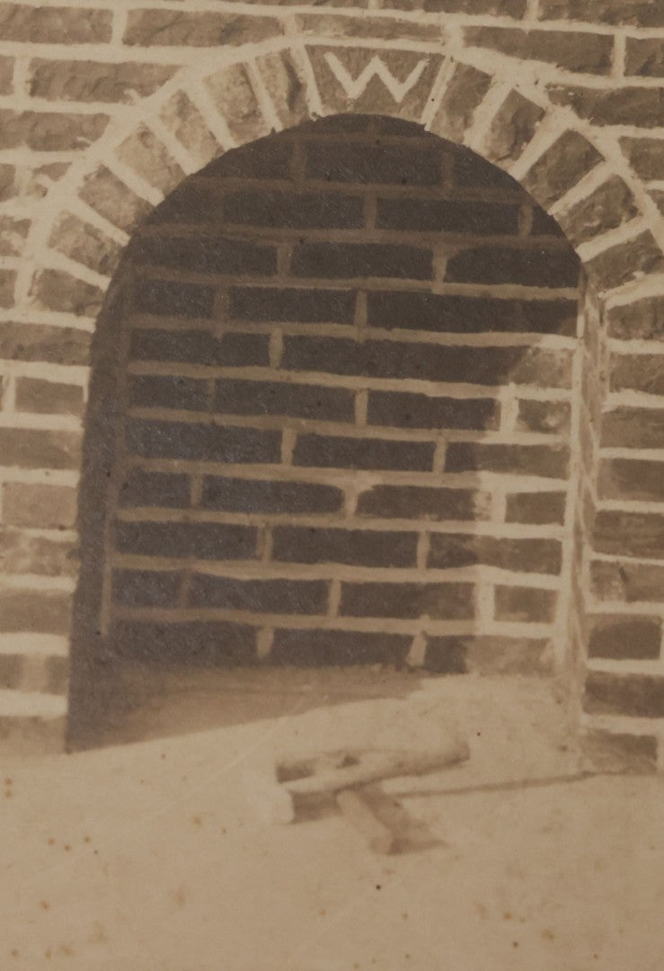 Lot 091 - Antique Boarded Photograph Of Two Young Bricklayers Posing With Tools In Front Of Newly Finished Fireplace With "W" Monogram